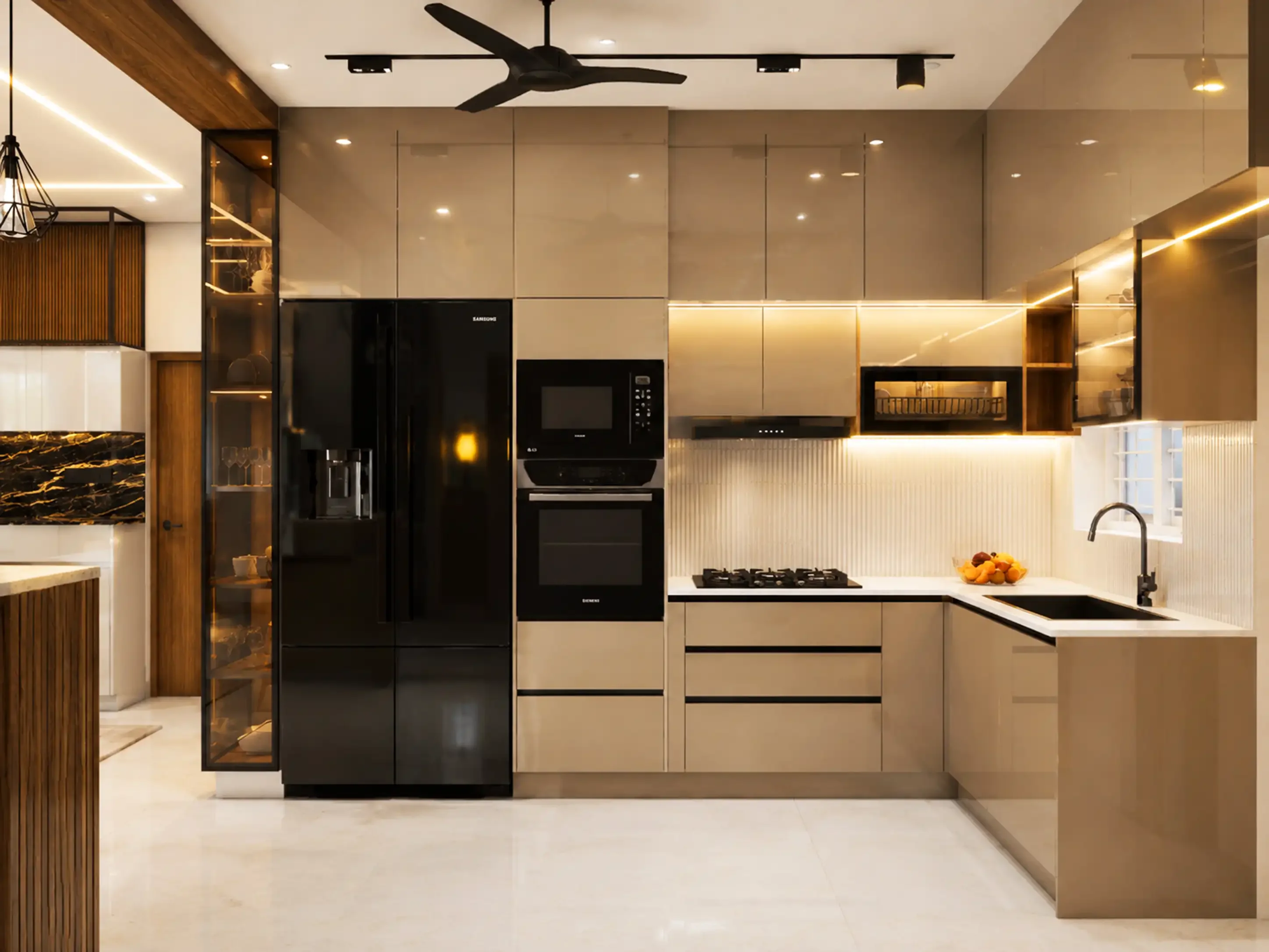 Contemporary L-shaped kitchen with dark worktops and warm under-cabinet lighting